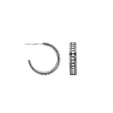 Sterling silver Bali hoop earrings with dotted design and rope detailing – lightweight handcrafted artisan jewelry for everyday wear.